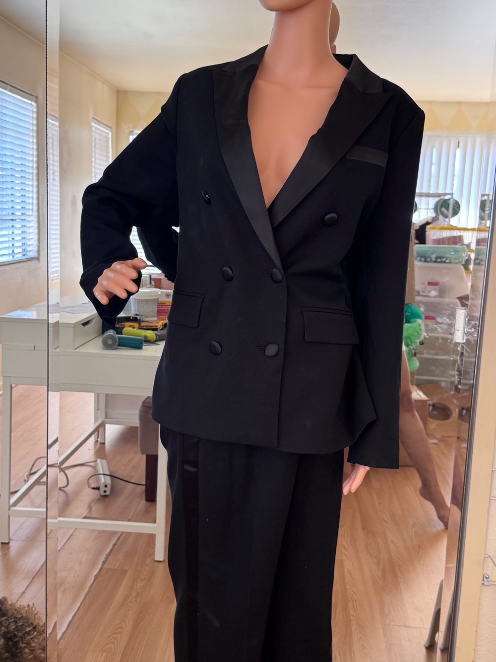 Classic Black Double-Breasted Women's Blazer and tuxedo wide leg slacks.